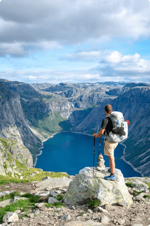 man on the top of the mountain looking down